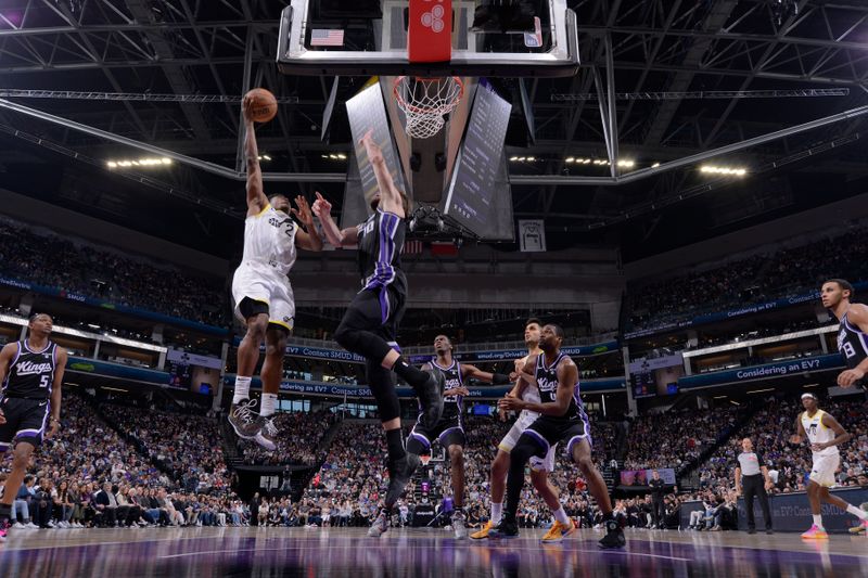 SACRAMENTO, CA - MARCH 31: Colin Sexton #2 of the Utah Jazz drives to the basket during the game against the Sacramento Kings on March 31, 2024 at Golden 1 Center in Sacramento, California. NOTE TO USER: User expressly acknowledges and agrees that, by downloading and or using this Photograph, user is consenting to the terms and conditions of the Getty Images License Agreement. Mandatory Copyright Notice: Copyright 2024 NBAE (Photo by Rocky Widner/NBAE via Getty Images)