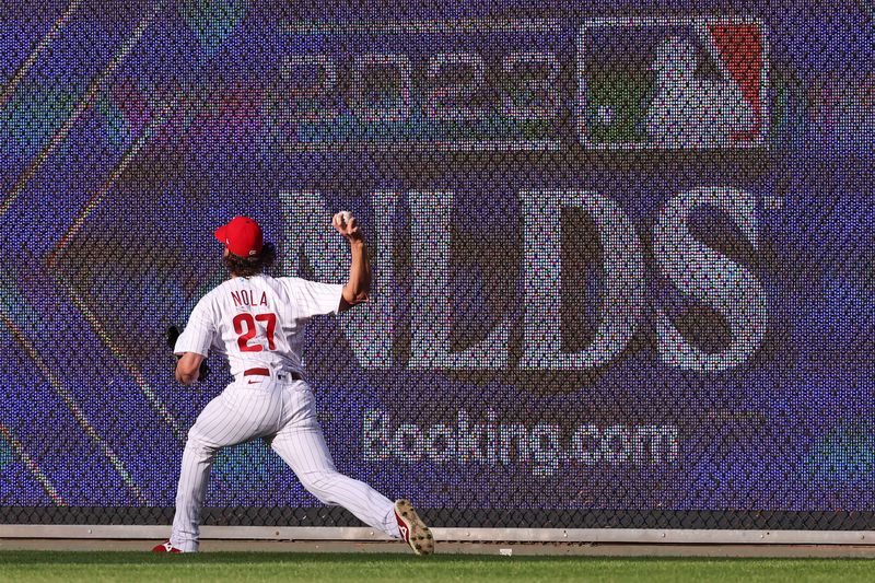 Oct 11, 2023; Philadelphia, Pennsylvania, USA;  Philadelphia Phillies starting pitcher Aaron Nola (27) warms up before playing against the Atlanta Braves in game three of the NLDS for the 2023 MLB playoffs at Citizens Bank Park. Mandatory Credit: Bill Streicher-USA TODAY Sports