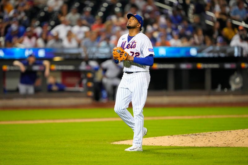 Aug 30, 2023; New York City, New York, USA;  New York Mets pitcher Denyi Reyes (72) reacts to coming out of the game in the sixth inning against the Texas Rangers at Citi Field. Mandatory Credit: Gregory Fisher-USA TODAY Sports