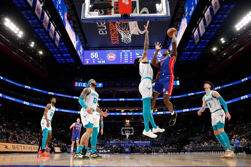 DETROIT, MI - JANUARY 24: Jalen Duren #0 of the Detroit Pistons drives to the basket during the game against the Charlotte Hornets on January 24, 2024 at Little Caesars Arena in Detroit, Michigan. NOTE TO USER: User expressly acknowledges and agrees that, by downloading and/or using this photograph, User is consenting to the terms and conditions of the Getty Images License Agreement. Mandatory Copyright Notice: Copyright 2024 NBAE (Photo by Brian Sevald/NBAE via Getty Images)