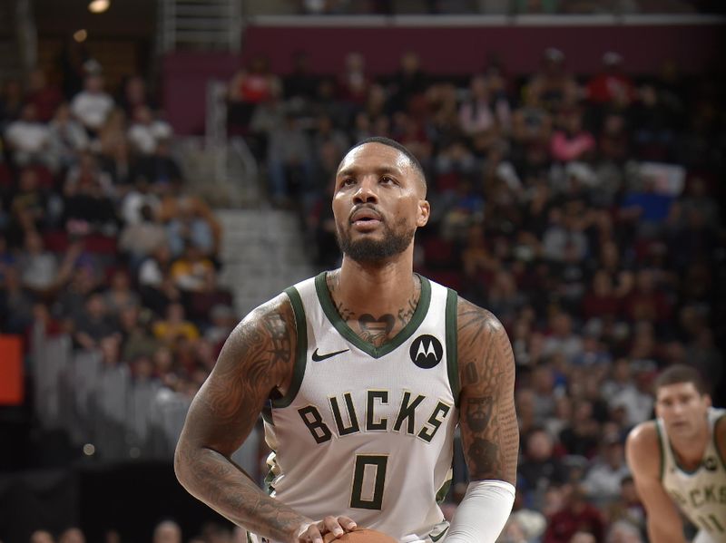 CLEVELAND, OH - NOVEMBER 4: Damian Lillard #0 of the Milwaukee Bucks prepares to shoot a free throw during the game against the Cleveland Cavaliers on November 4, 2024 at Rocket Mortgage FieldHouse in Cleveland, Ohio. NOTE TO USER: User expressly acknowledges and agrees that, by downloading and/or using this Photograph, user is consenting to the terms and conditions of the Getty Images License Agreement. Mandatory Copyright Notice: Copyright 2024 NBAE (Photo by David Liam Kyle/NBAE via Getty Images)