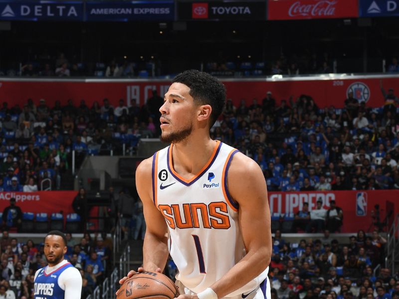 LOS ANGELES, CA - APRIL 20: Devin Booker #1 of the Phoenix Suns looks to shoot a three point basket during the game against the LA Clippers during Round 1 Game 3 of the 2023 NBA Playoffs on April 20, 2023 at Crypto.Com Arena in Los Angeles, California. NOTE TO USER: User expressly acknowledges and agrees that, by downloading and/or using this Photograph, user is consenting to the terms and conditions of the Getty Images License Agreement. Mandatory Copyright Notice: Copyright 2023 NBAE (Photo by Andrew D. Bernstein/NBAE via Getty Images)