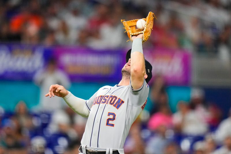 Aug 16, 2023; Miami, Florida, USA; Houston Astros third baseman Alex Bregman (2) catches a fly ball against the Miami Marlins during the fifth inning at loanDepot Park. Mandatory Credit: Rich Storry-USA TODAY Sports