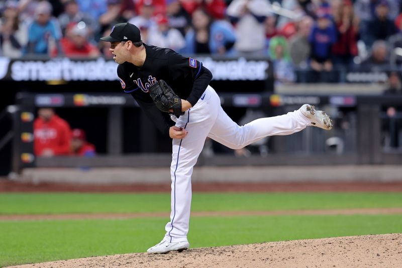 Sep 30, 2023; New York City, New York, USA; New York Mets relief pitcher Adam Ottavino (0) follows through on a pitch against the Philadelphia Phillies during the ninth inning at Citi Field. Mandatory Credit: Brad Penner-USA TODAY Sports