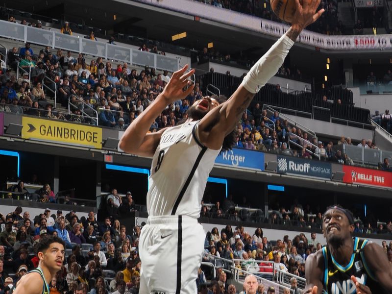 INDIANAPOLIS, IN - MARCH 16: Trendon Watford #9 of the Brooklyn Nets grabs the rebound during the game against the Indiana Pacers on March 16, 2024 at Gainbridge Fieldhouse in Indianapolis, Indiana. NOTE TO USER: User expressly acknowledges and agrees that, by downloading and or using this Photograph, user is consenting to the terms and conditions of the Getty Images License Agreement. Mandatory Copyright Notice: Copyright 2024 NBAE (Photo by Ron Hoskins/NBAE via Getty Images)