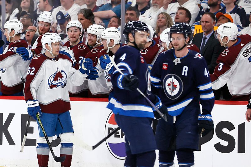 Apr 30, 2024; Winnipeg, Manitoba, CAN; Colorado Avalanche left wing Artturi Lehkonen (62) celebrates his second period goal against the Winnipeg Jets in game five of the first round of the 2024 Stanley Cup Playoffs at Canada Life Centre. Mandatory Credit: James Carey Lauder-USA TODAY Sports