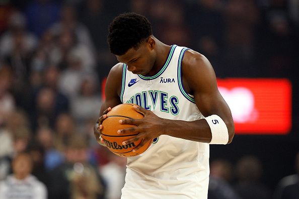 MINNEAPOLIS, MINNESOTA - DECEMBER 16: Anthony Edwards #5 of the Minnesota Timberwolves looks on prior tot the start of the game against the Indiana Pacers at Target Center on December 16, 2023 in Minneapolis, Minnesota. NOTE TO USER: User expressly acknowledges and agrees that, by downloading and or using this photograph, User is consenting to the terms and conditions of the Getty Images License Agreement. (Photo by David Berding/Getty Images)