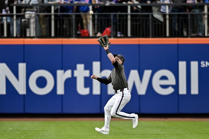 May 11, 2024; New York City, New York, USA; New York Mets outfielder Harrison Bader (44) catches a fly ball for an out against the Atlanta Braves during the ninth inning at Citi Field. Mandatory Credit: John Jones-USA TODAY Sports