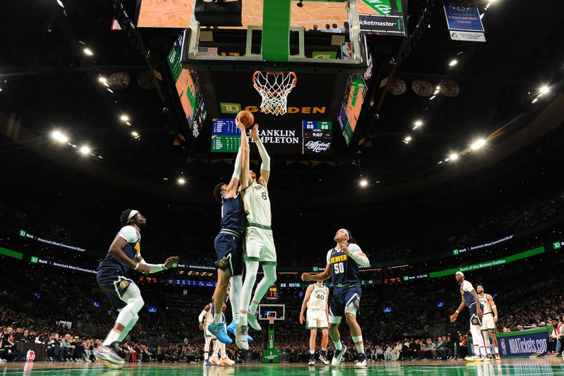 BOSTON, MA - JANUARY 19:  Kristaps Porzingis #8 of the Boston Celtics drives to the basket during the game against the Denver Nuggets on January 19, 2024 at the TD Garden in Boston, Massachusetts. NOTE TO USER: User expressly acknowledges and agrees that, by downloading and or using this photograph, User is consenting to the terms and conditions of the Getty Images License Agreement. Mandatory Copyright Notice: Copyright 2024 NBAE  (Photo by Brian Babineau/NBAE via Getty Images)