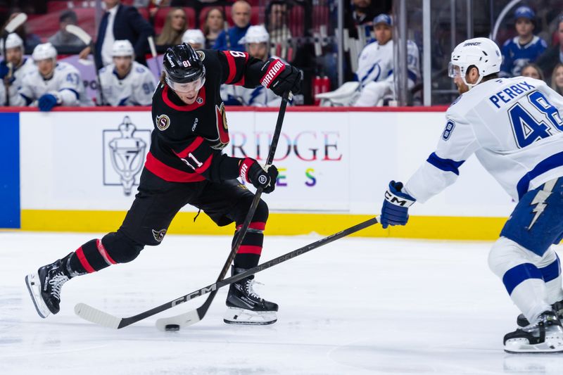 Apr 3, 2025; Ottawa, Ontario, CAN; Ottawa Senators right wing Adam Gaudette (81) shoots the puck past Tampa Bay Lightning defenseman Nick Perbix (48) in the first period at the Canadian Tire Centre. Mandatory Credit: Marc DesRosiers-Imagn Images