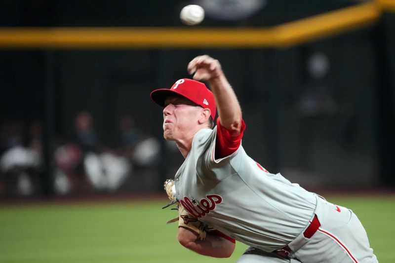 Aug 8, 2024; Phoenix, Arizona, USA; Philadelphia Phillies pitcher Kolby Allard (49) pitches against the Arizona Diamondbacks during the second inning at Chase Field. Mandatory Credit: Joe Camporeale-USA TODAY Sports