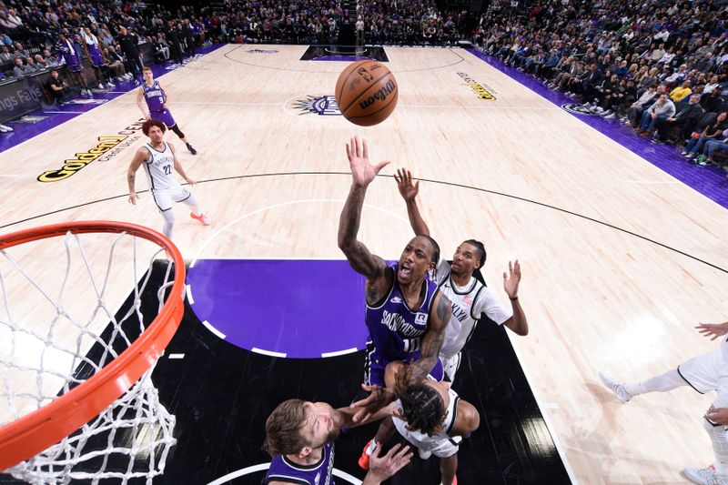 SACRAMENTO, CA - NOVEMBER 24: DeMar DeRozan #10 of the Sacramento Kings shoots the ball during the game against the Brooklyn Nets on November 24, 2024 at Golden 1 Center in Sacramento, California. NOTE TO USER: User expressly acknowledges and agrees that, by downloading and or using this Photograph, user is consenting to the terms and conditions of the Getty Images License Agreement. Mandatory Copyright Notice: Copyright 2024 NBAE (Photo by Rocky Widner/NBAE via Getty Images)