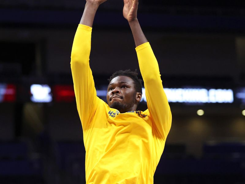 Nov 28, 2025; Pittsburgh, Pennsylvania, USA;  Pittsburgh Panthers forward Papa Amadou Kante (4) warms up before the game against the Ohio State Buckeyes at the Petersen Events Center. Mandatory Credit: Charles LeClaire-Imagn Images