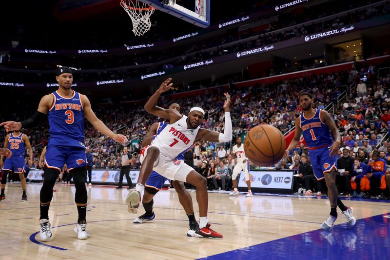 DETROIT, MICHIGAN - APRIL 27: Paul Reed #7 of the Detroit Pistons and Josh Hart #3 of the New York Knicks battle for the loose ball in Game Four of the Eastern Conference First Round NBA Playoffs at Little Caesars Arena on April 27, 2025 in Detroit, Michigan. NOTE TO USER: User expressly acknowledges and agrees that, by downloading and or using this photograph, User is consenting to the terms and conditions of the Getty Images License Agreement. (Photo by Gregory Shamus/Getty Images)