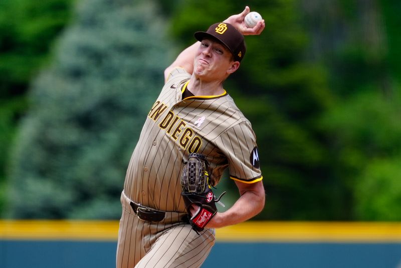 May 11, 2025; Denver, Colorado, USA; San Diego Padres starting pitcher Nick Pivetta (27) delivers a pitch in the first inning against the Colorado Rockies at Coors Field. Mandatory Credit: Ron Chenoy-Imagn Images