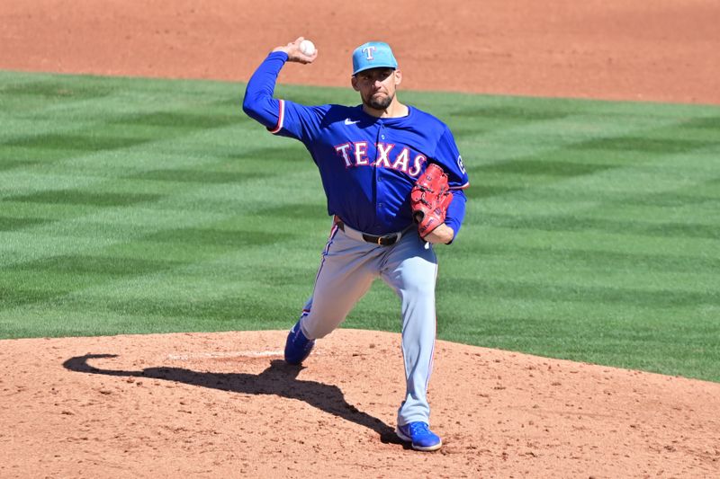 Mar 11, 2024; Tempe, Arizona, USA;  Texas Rangers starting pitcher Nathan Eovaldi (17) throws in the third inning against the Los Angeles Angels during a spring training game at Tempe Diablo Stadium. Mandatory Credit: Matt Kartozian-USA TODAY Sports
