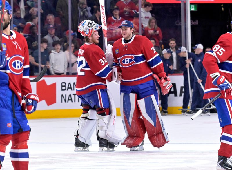Jan 7, 2026; Montreal, Quebec, CAN; Montreal Canadiens players including goalies Jacob Fowler (32) and Jakub Dobes (75) celebrates the win against the Calgary Flames at the Bell Centre. Mandatory Credit: Eric Bolte-Imagn Images