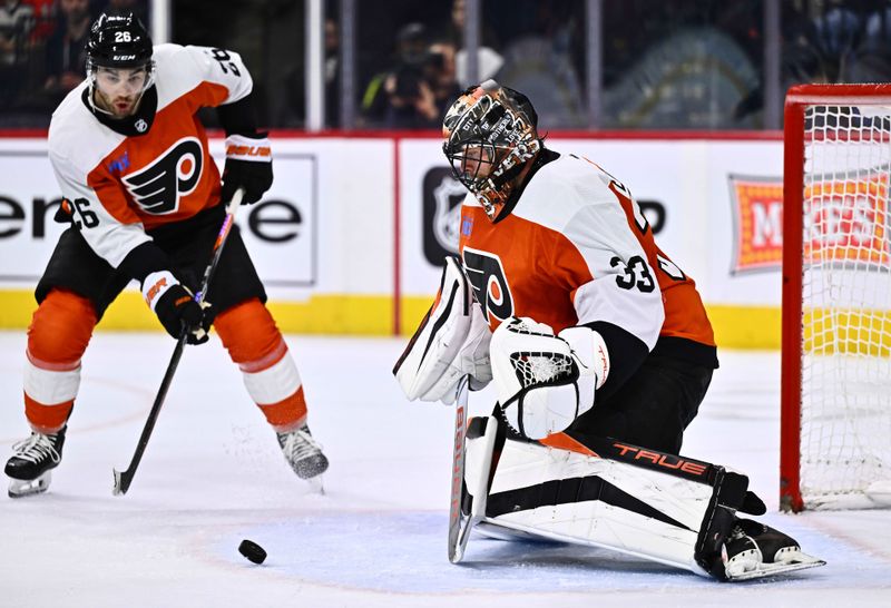 Feb 8, 2024; Philadelphia, Pennsylvania, USA; Philadelphia Flyers goalie Samuel Ersson (33) makes a save against the Winnipeg Jets in the second period at Wells Fargo Center. Mandatory Credit: Kyle Ross-USA TODAY Sports