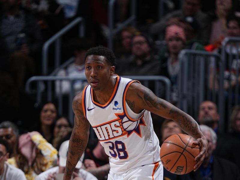 DENVER, CO - MARCH 5: Saben Lee #38 of the Phoenix Suns dribbles the ball during the game against the Denver Nuggets on March 5, 2024 at the Ball Arena in Denver, Colorado. NOTE TO USER: User expressly acknowledges and agrees that, by downloading and/or using this Photograph, user is consenting to the terms and conditions of the Getty Images License Agreement. Mandatory Copyright Notice: Copyright 2024 NBAE (Photo by Garrett Ellwood/NBAE via Getty Images)