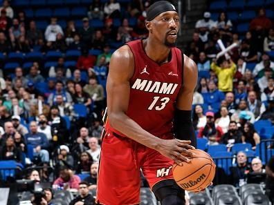 ORLANDO, FL - DECEMBER 20: Bam Adebayo #13 of the Miami Heat handles the ball during the game against the Orlando Magic on December 20, 2023 at the Kia Center in Orlando, Florida. NOTE TO USER: User expressly acknowledges and agrees that, by downloading and or using this photograph, User is consenting to the terms and conditions of the Getty Images License Agreement. Mandatory Copyright Notice: Copyright 2023 NBAE (Photo by Fernando Medina/NBAE via Getty Images)