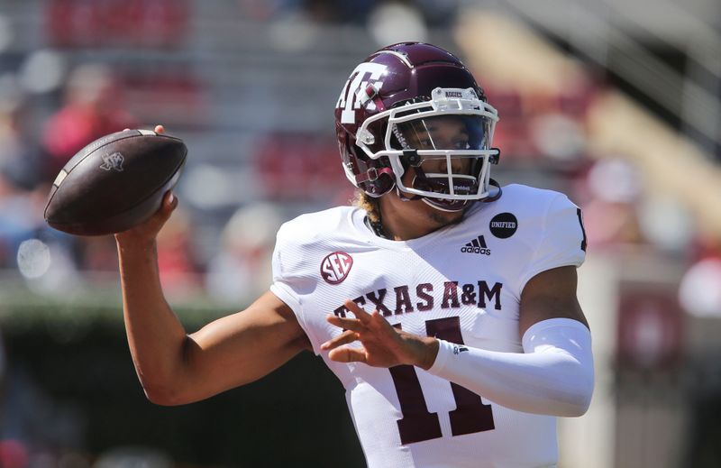 Oct 3, 2020; Tuscaloosa, Alabama, USA; Texas A&M quarterback Kellen Mond (11) warms up at Bryant-Denny Stadium before the game with Alabama. Mandatory Credit: Gary Cosby Jr/The Tuscaloosa News via USA TODAY Sports