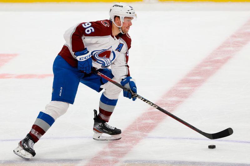 Feb 11, 2023; Sunrise, Florida, USA; Colorado Avalanche right wing Mikko Rantanen (96) moves the puck during the third period against the Florida Panthers at FLA Live Arena. Mandatory Credit: Sam Navarro-USA TODAY Sports