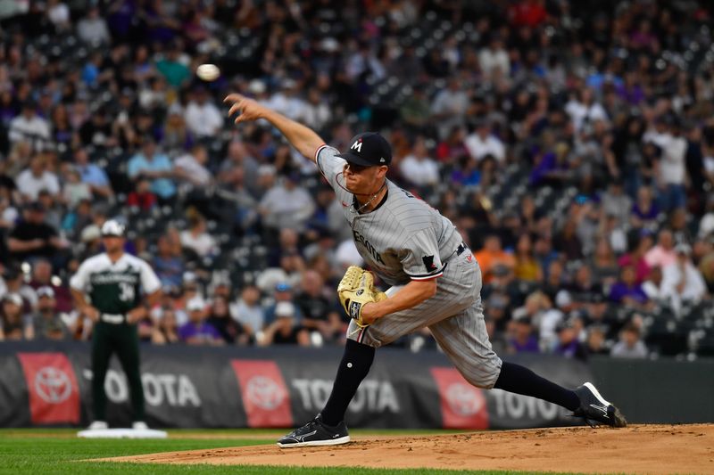 Sep 30, 2023; Denver, Colorado, USA; Minnesota Twins relief pitcher Emilio Pagan (15) delivers a pitch in the first inning against the Colorado Rockies at Coors Field. Mandatory Credit: John Leyba-USA TODAY Sports