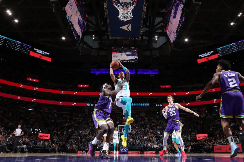 SALT LAKE CITY, UT - FEBRUARY 22: Tre Mann #23 of the Charlotte Hornets  drives to the basket during the game against the Utah Jazz on February 22, 2024 at Delta Center in Salt Lake City, Utah. NOTE TO USER: User expressly acknowledges and agrees that, by downloading and or using this Photograph, User is consenting to the terms and conditions of the Getty Images License Agreement. Mandatory Copyright Notice: Copyright 2024 NBAE (Photo by Melissa Majchrzak/NBAE via Getty Images)