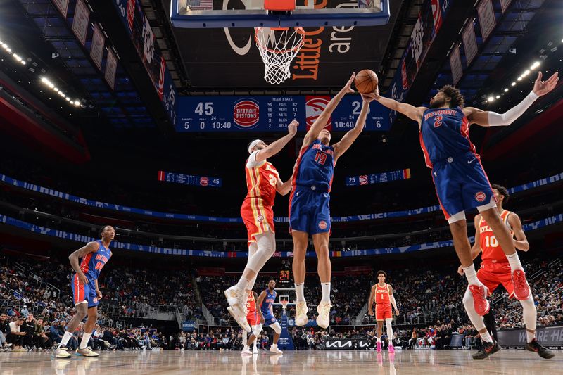 DETROIT, MI - NOVEMBER 8: Cade Cunningham #2 of the Detroit Pistons goes up for the rebound during the game against the Atlanta Hawks on November  8, 2024 at Little Caesars Arena in Detroit, Michigan. NOTE TO USER: User expressly acknowledges and agrees that, by downloading and/or using this photograph, User is consenting to the terms and conditions of the Getty Images License Agreement. Mandatory Copyright Notice: Copyright 2024 NBAE (Photo by Chris Schwegler/NBAE via Getty Images)