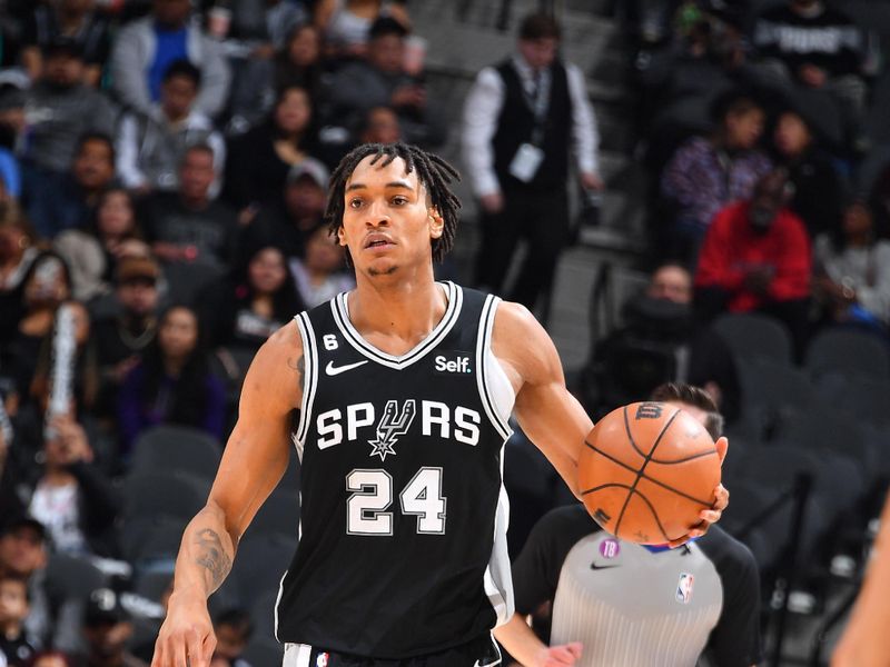 SAN ANTONIO, TX - DECEMBER 4: Devin Vassell #24 of the San Antonio Spurs dribbles the ball during the game against the Phoenix Suns on December 4, 2022 at the AT&T Center in San Antonio, Texas. NOTE TO USER: User expressly acknowledges and agrees that, by downloading and or using this photograph, user is consenting to the terms and conditions of the Getty Images License Agreement. Mandatory Copyright Notice: Copyright 2022 NBAE (Photos by Michael Gonzales/NBAE via Getty Images)