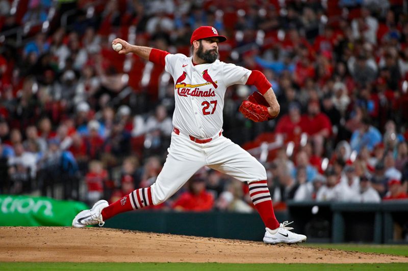 Apr 9, 2024; St. Louis, Missouri, USA;  St. Louis Cardinals relief pitcher Andrew Kittredge (27) pitches against the Philadelphia Phillies during the seventh inning at Busch Stadium. Mandatory Credit: Jeff Curry-USA TODAY Sports