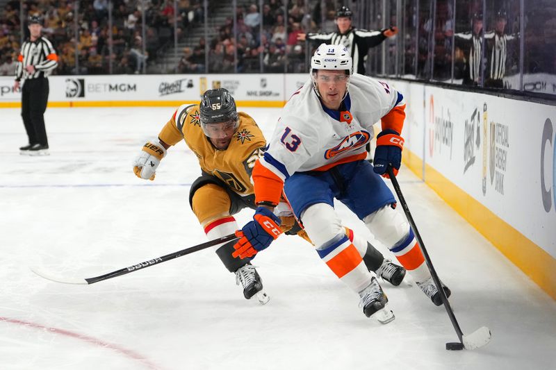 Nov 13, 2025; Las Vegas, Nevada, USA; New York Islanders center Mathew Barzal (13) skates ahead of Vegas Golden Knights right wing Keegan Kolesar (55) during the second period at T-Mobile Arena. Mandatory Credit: Stephen R. Sylvanie-Imagn Images