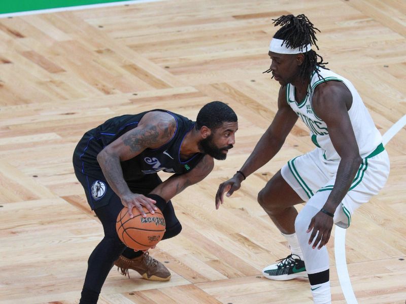 BOSTON, MA - JUNE 6: Jrue Holiday #4 of the Boston Celtics plays defense during the game  against Kyrie Irving #11 of the Dallas Mavericks during Game 1 of the 2024 NBA Finals on June 6, 2024 at the TD Garden in Boston, Massachusetts. NOTE TO USER: User expressly acknowledges and agrees that, by downloading and or using this photograph, User is consenting to the terms and conditions of the Getty Images License Agreement. Mandatory Copyright Notice: Copyright 2024 NBAE  (Photo by Chris Marion/NBAE via Getty Images)