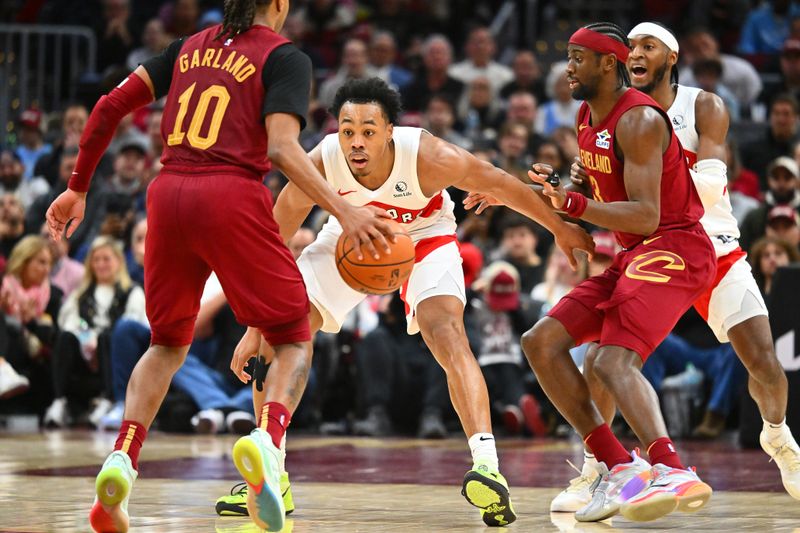 CLEVELAND, OHIO - JANUARY 09: Scottie Barnes #4 of the Toronto Raptors guards Darius Garland #10 of the Cleveland Cavaliers during the fourth quarter at Rocket Mortgage Fieldhouse on January 09, 2025 in Cleveland, Ohio. The Cavaliers defeated the Raptors 132-126. NOTE TO USER: User expressly acknowledges and agrees that, by downloading and or using this photograph, User is consenting to the terms and conditions of the Getty Images License Agreement. (Photo by Jason Miller/Getty Images)