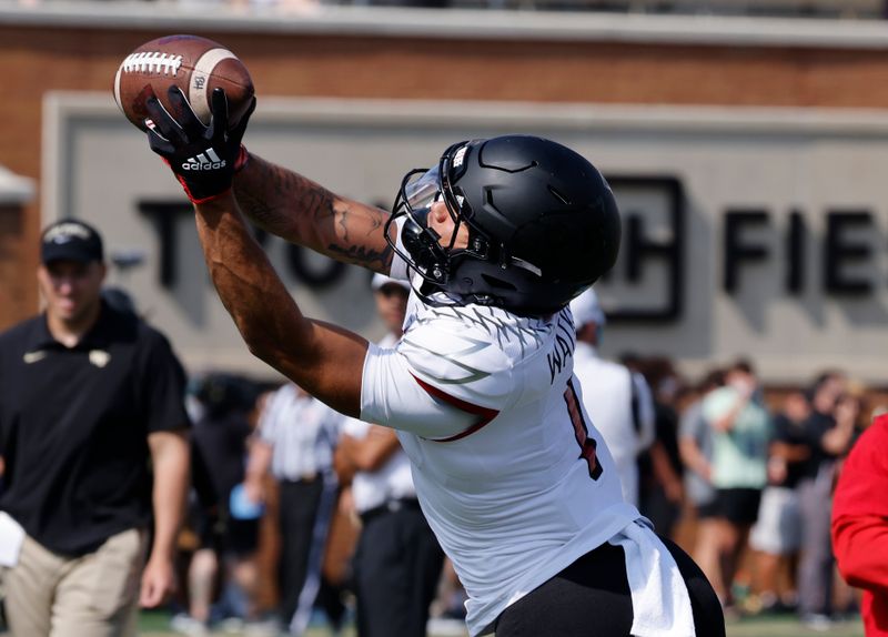 Oct 2, 2021; Winston-Salem, North Carolina, USA; Louisville Cardinals wide receiver Jordan Watkins (1) catches a pass before the game against the Wake Forest Demon Deacons at Truist Field. Mandatory Credit: Reinhold Matay-USA TODAY Sports