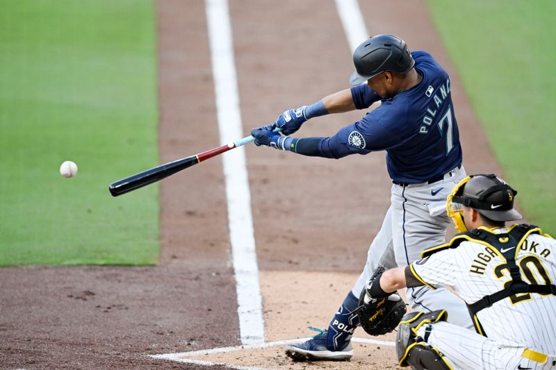 Jun 9, 2024; San Diego, California, USA; Seattle Mariners second baseman Jorge Polanco (7) hits a single during the second inning against the San Diego Padres at Petco Park. Mandatory Credit: Denis Poroy-USA TODAY Sports at Petco Park. 