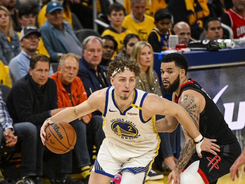 SAN FRANCISCO, CA - APRIL 26:   Brandin Podziemski #2 of the Golden State Warriors dribbles the ball during the game against the Houston Rockets during Round 1 Game 3 of the 2025 NBA Playoffs   on April 26, 2025 at Chase Center in San Francisco, California. NOTE TO USER: User expressly acknowledges and agrees that, by downloading and or using this photograph, user is consenting to the terms and conditions of Getty Images License Agreement. Mandatory Copyright Notice: Copyright 2025 NBAE (Photo by David Dow/NBAE via Getty Images)