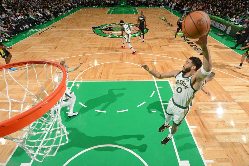 BOSTON, MA - JANUARY 30: Jayson Tatum #0 of the Boston Celtics rebounds the ball during the game against the Indiana Pacers on January 30, 2024 at the TD Garden in Boston, Massachusetts. NOTE TO USER: User expressly acknowledges and agrees that, by downloading and or using this photograph, User is consenting to the terms and conditions of the Getty Images License Agreement. Mandatory Copyright Notice: Copyright 2024 NBAE  (Photo by Brian Babineau/NBAE via Getty Images)