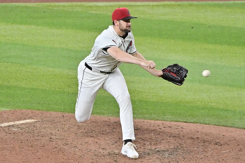 Jul 31, 2024; Phoenix, Arizona, USA; Arizona Diamondbacks pitcher Ryan Thompson (81) pitches in the ninth inning against the Washington Nationals at Chase Field. Mandatory Credit: Matt Kartozian-USA TODAY Sports