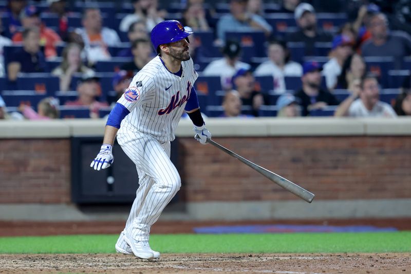 Jun 13, 2024; New York City, New York, USA; New York Mets designated hitter J.D. Martinez (28) watches his ninth inning walkoff two run home run against the Miami Marlins at Citi Field. Mandatory Credit: Brad Penner-USA TODAY Sports