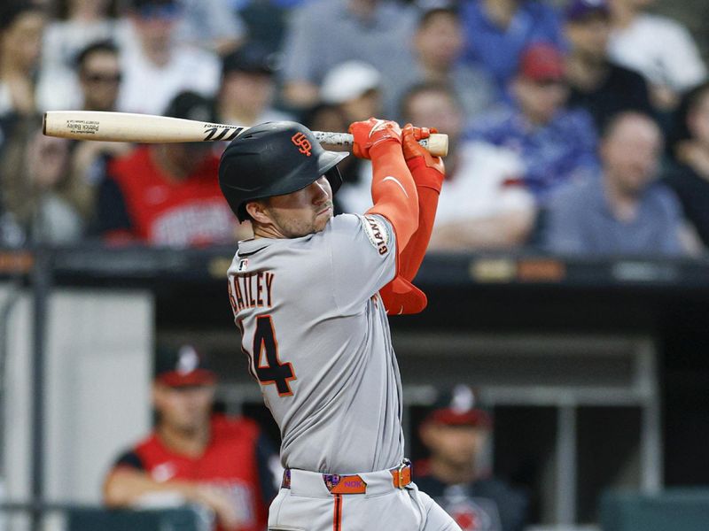 Jun 27, 2025; Chicago, Illinois, USA; San Francisco Giants catcher Patrick Bailey (14) hits a two-run triple against the Chicago White Sox during the sixth inning at Rate Field. Mandatory Credit: Kamil Krzaczynski-Imagn Images