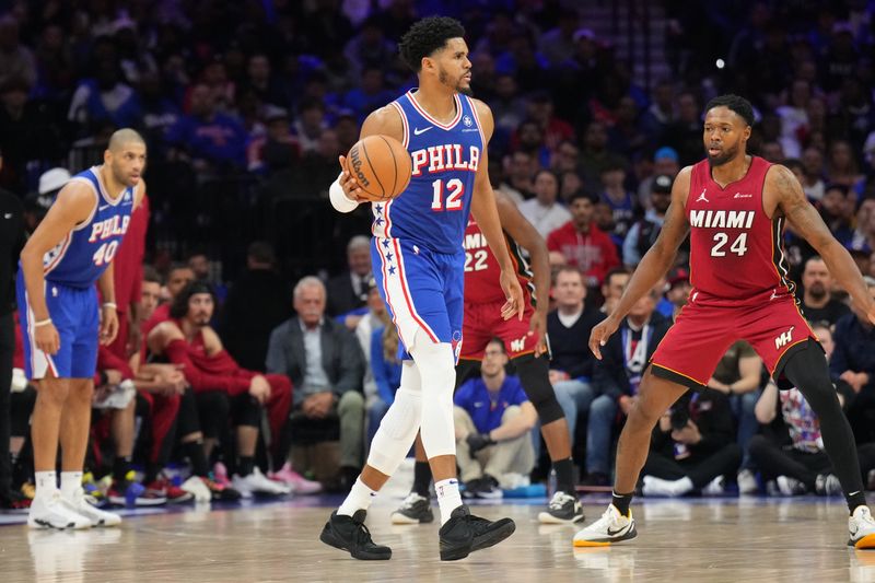 PHILADELPHIA, PA - APRIL 17: Tobias Harris #12 of the Philadelphia 76ers dribbles the ball during the game against the Miami Heat during the 2024 NBA Play-In Tournament on April 17, 2024 at the Wells Fargo Center in Philadelphia, Pennsylvania NOTE TO USER: User expressly acknowledges and agrees that, by downloading and/or using this Photograph, user is consenting to the terms and conditions of the Getty Images License Agreement. Mandatory Copyright Notice: Copyright 2024 NBAE (Photo by Jesse D. Garrabrant/NBAE via Getty Images)