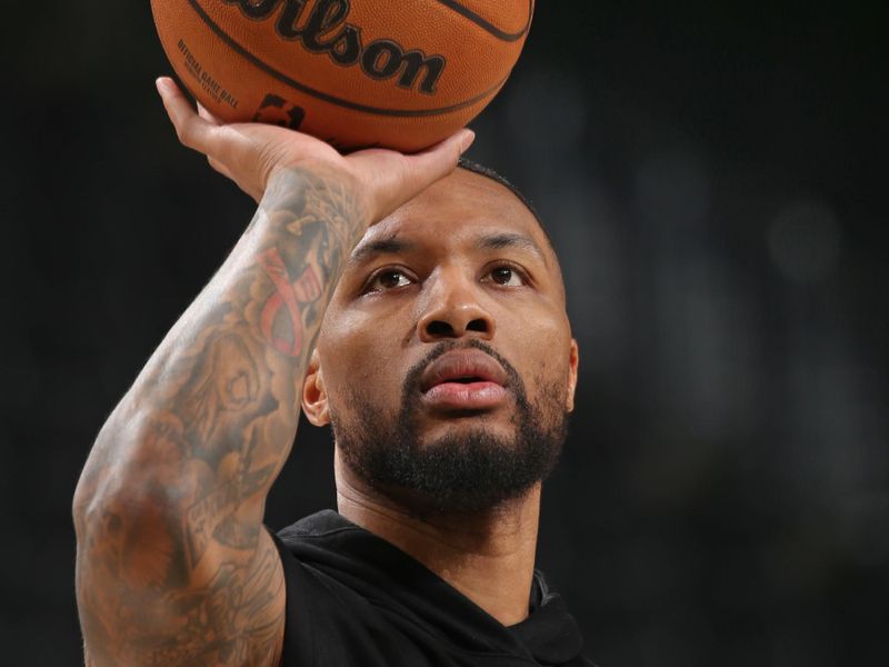 MILWAUKEE, WI - MARCH 4: Damian Lillard #0 of the Milwaukee Bucks warms up before the game against the LA Clippers on March 4, 2024 at the Fiserv Forum Center in Milwaukee, Wisconsin. NOTE TO USER: User expressly acknowledges and agrees that, by downloading and or using this Photograph, user is consenting to the terms and conditions of the Getty Images License Agreement. Mandatory Copyright Notice: Copyright 2024 NBAE (Photo by Gary Dineen/NBAE via Getty Images).