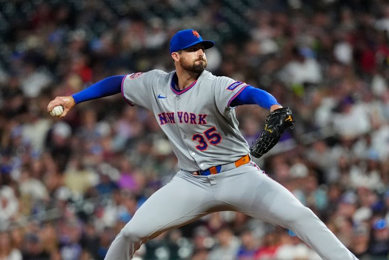 Jun 7, 2025; Denver, Colorado, USA; New York Mets starting pitcher Clay Holmes (35) delivers a pitch in the fifth inning against the Colorado Rockies at Coors Field. Mandatory Credit: Ron Chenoy-Imagn Images
