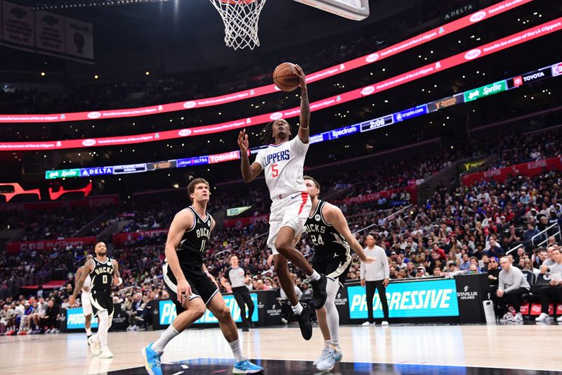 LOS ANGELES, CA - MARCH 10: Bones Hyland #5 of the LA Clippers shoots the ball during the game against the Milwaukee Bucks on March 10, 2024 at Crypto.Com Arena in Los Angeles, California. NOTE TO USER: User expressly acknowledges and agrees that, by downloading and/or using this Photograph, user is consenting to the terms and conditions of the Getty Images License Agreement. Mandatory Copyright Notice: Copyright 2024 NBAE (Photo by Adam Pantozzi/NBAE via Getty Images)