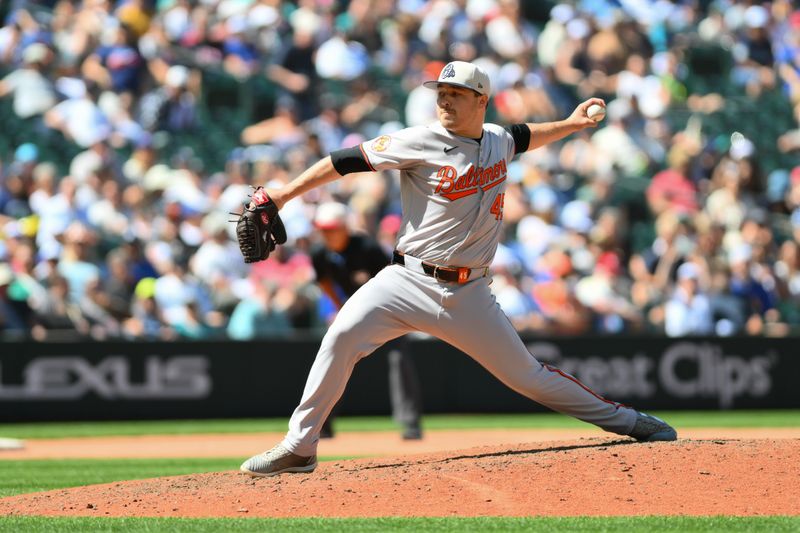 Jul 4, 2024; Seattle, Washington, USA; Baltimore Orioles relief pitcher Keegan Akin (45) pitches to the Seattle Mariners during the seventh inning at T-Mobile Park. Mandatory Credit: Steven Bisig-USA TODAY Sports