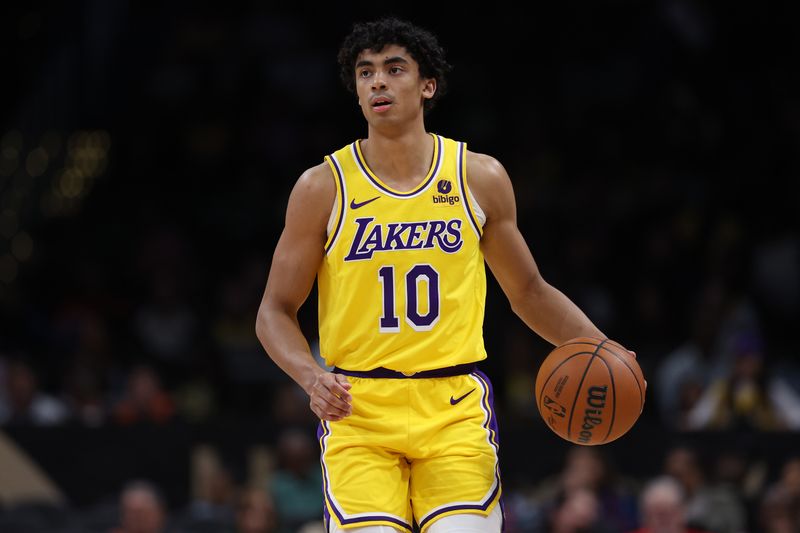 WASHINGTON, DC - APRIL 03: Max Christie #10 of the Los Angeles Lakers in action against the Washington Wizards during the second half at Capital One Arena on April 03, 2024 in Washington, DC. NOTE TO USER: User expressly acknowledges and agrees that, by downloading and or using this photograph, User is consenting to the terms and conditions of the Getty Images License Agreement. (Photo by Patrick Smith/Getty Images)