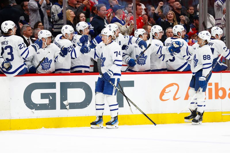 Mar 20, 2024; Washington, District of Columbia, USA; Toronto Maple Leafs center Bobby McMann (74) celebrates with teammates after scoring a goal against the Washington Capitals during the third period at Capital One Arena. Mandatory Credit: Amber Searls-USA TODAY Sports