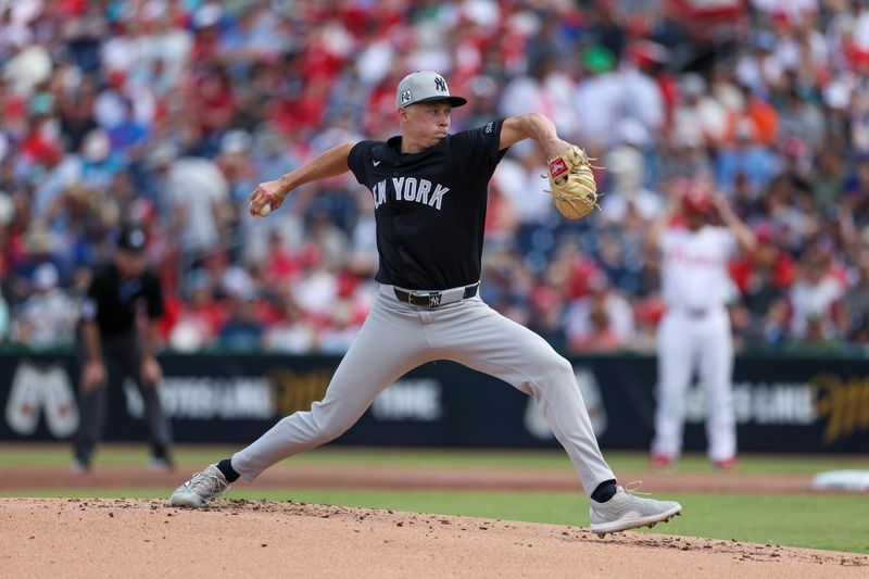 Mar 4, 2025; Clearwater, Florida, USA; New York Yankees pitcher Will Warren (98) throws a pitch against the Philadelphia Phillies in the first inning during spring training at BayCare Ballpark. Mandatory Credit: Nathan Ray Seebeck-Imagn Images