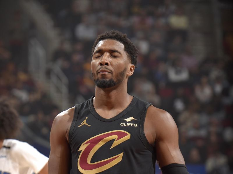 CLEVELAND, OH - NOVEMBER 1: Donovan Mitchell #45 of the Cleveland Cavaliers prepares to shoot a free throw during the game against the Orlando Magic on November 1, 2024 at Rocket Mortgage FieldHouse in Cleveland, Ohio. NOTE TO USER: User expressly acknowledges and agrees that, by downloading and/or using this Photograph, user is consenting to the terms and conditions of the Getty Images License Agreement. Mandatory Copyright Notice: Copyright 2024 NBAE (Photo by David Liam Kyle/NBAE via Getty Images)